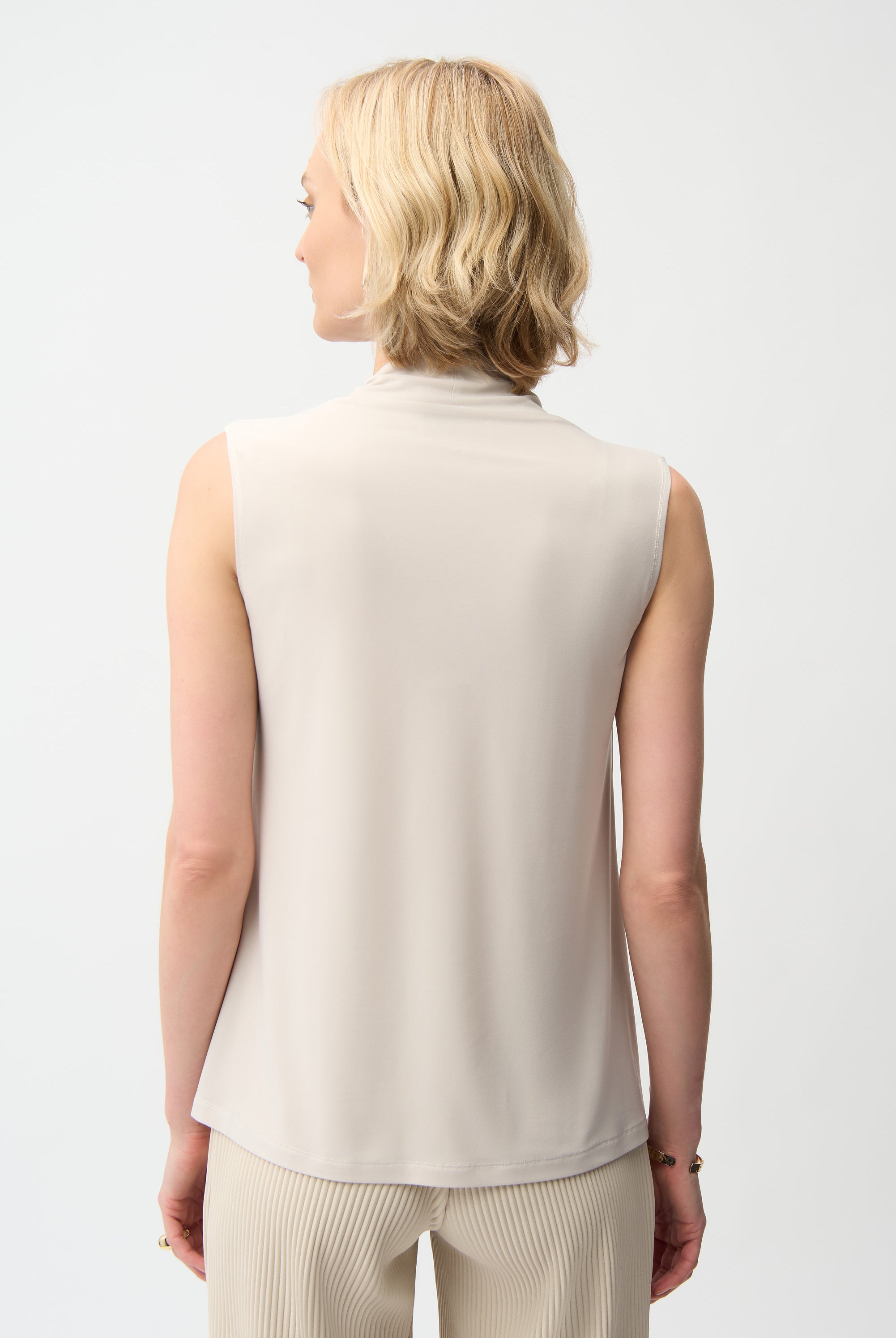 Silky Knit Sleeveless Trapeze Top With V-necklineline