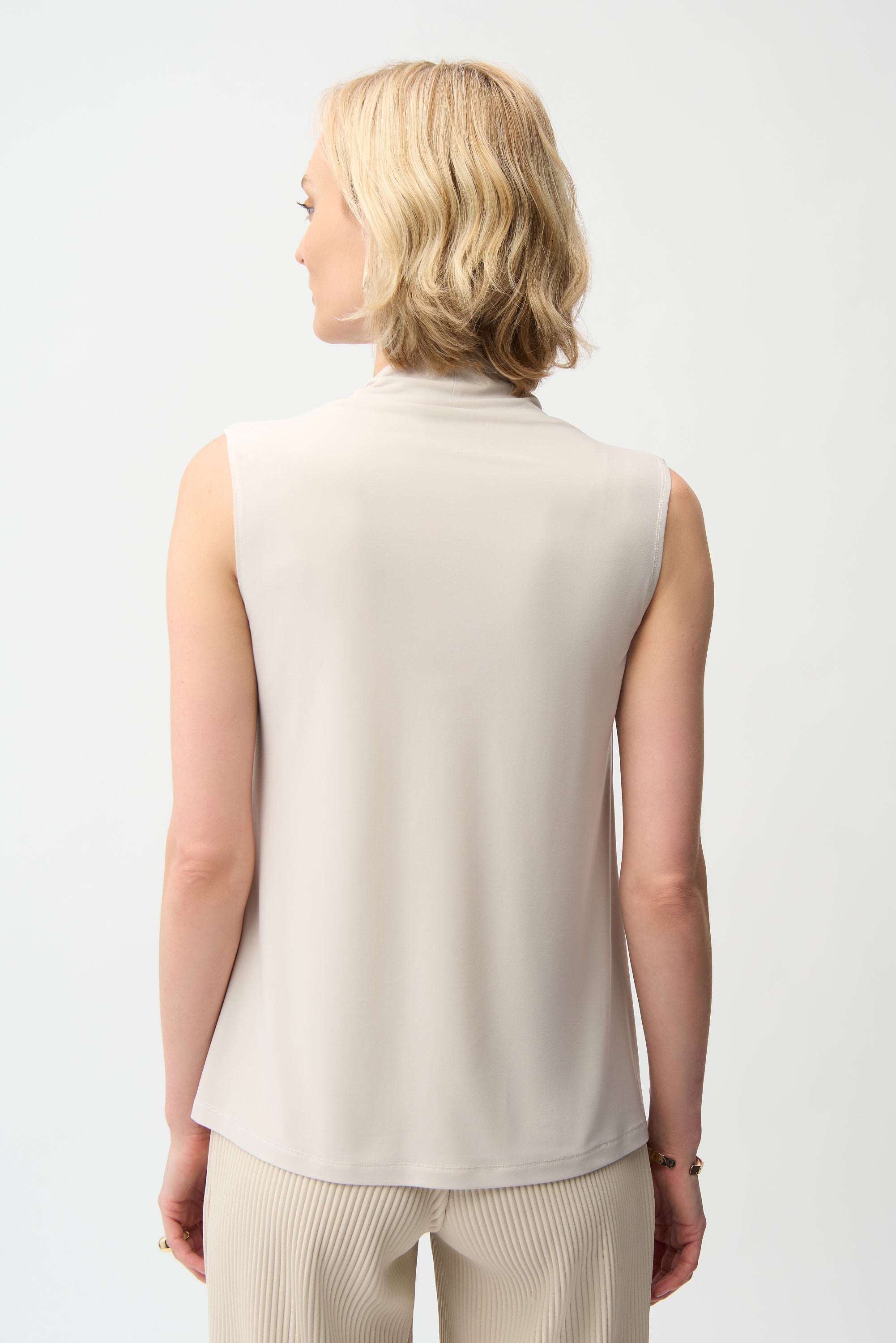 Silky Knit Sleeveless Trapeze Top With V-necklineline