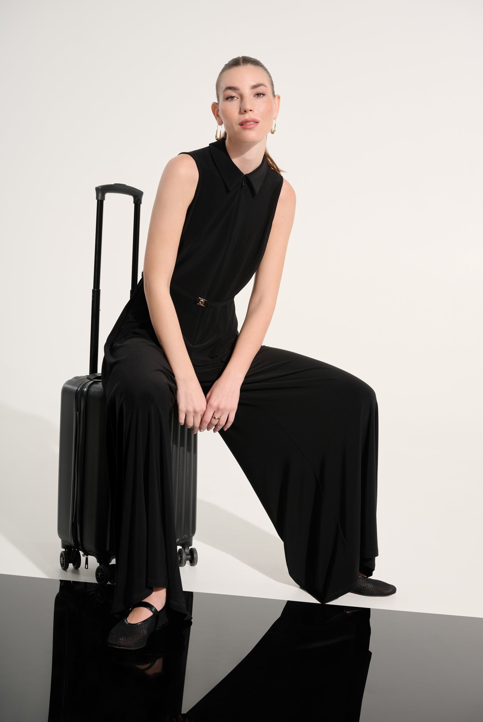 Silky Knit Wide Leg Jumpsuit With Zipped Neckline