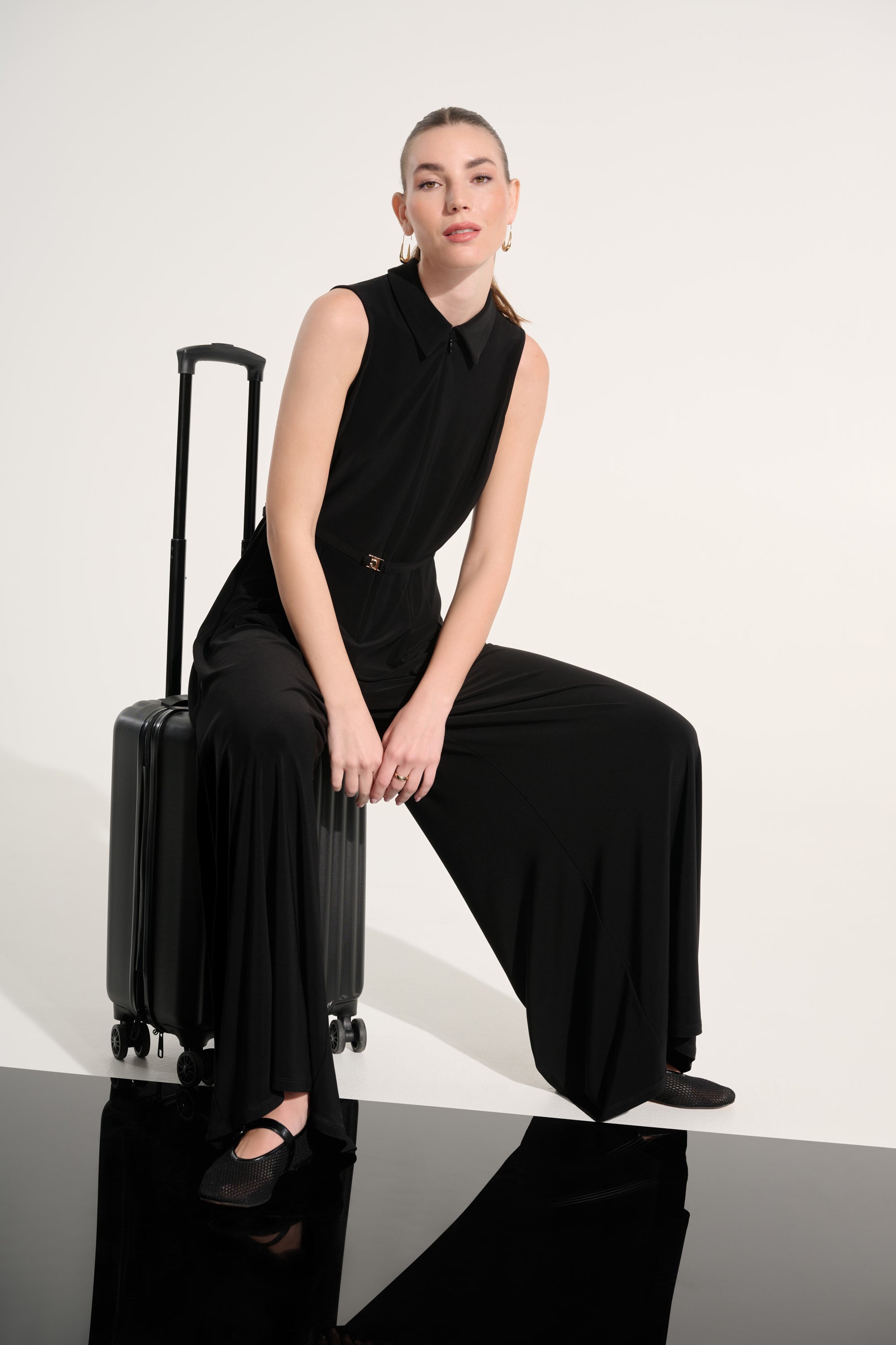 Silky Knit Wide Leg Jumpsuit With Zipped Neckline
