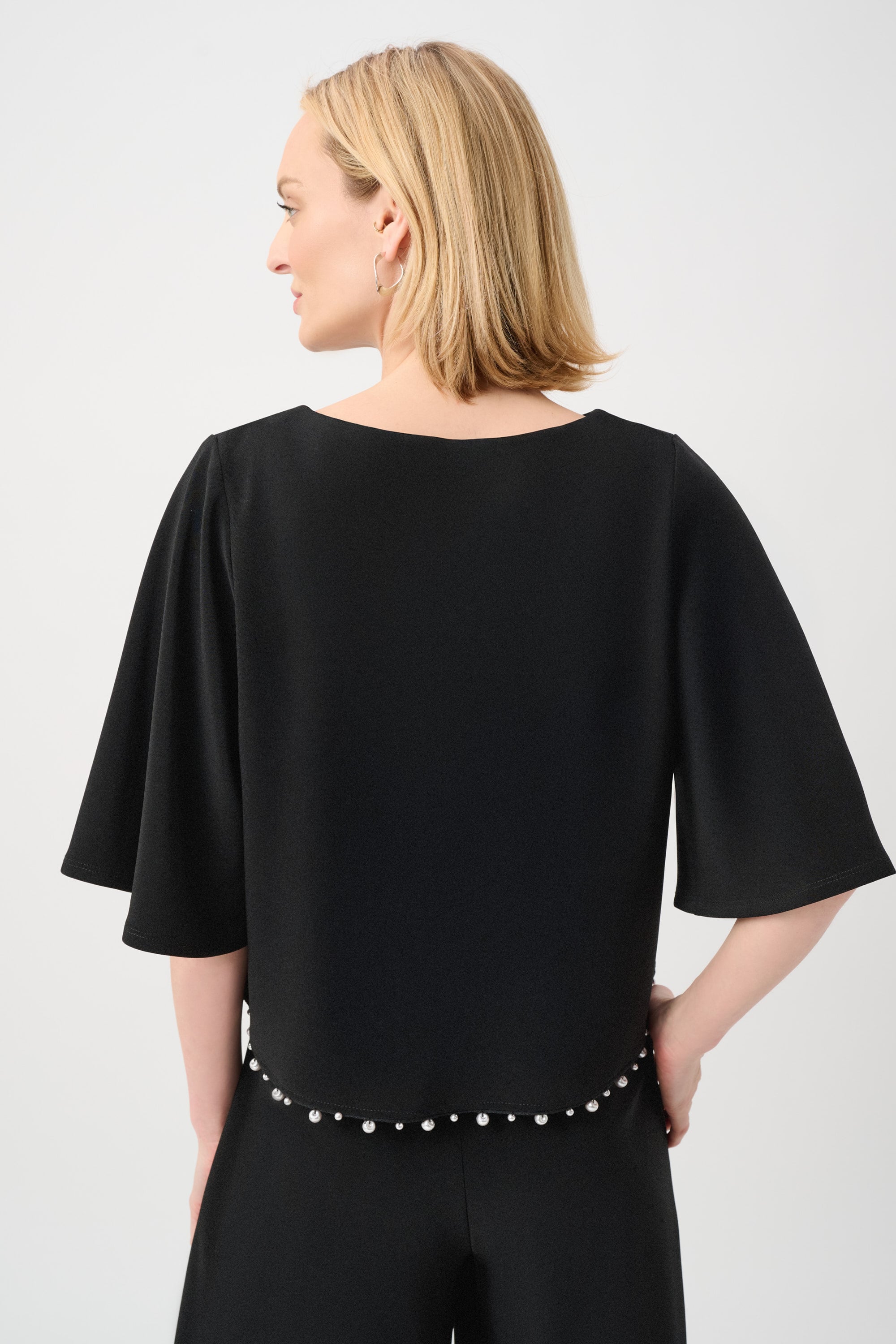 Silky Knit Flared Top With Pearl Detail