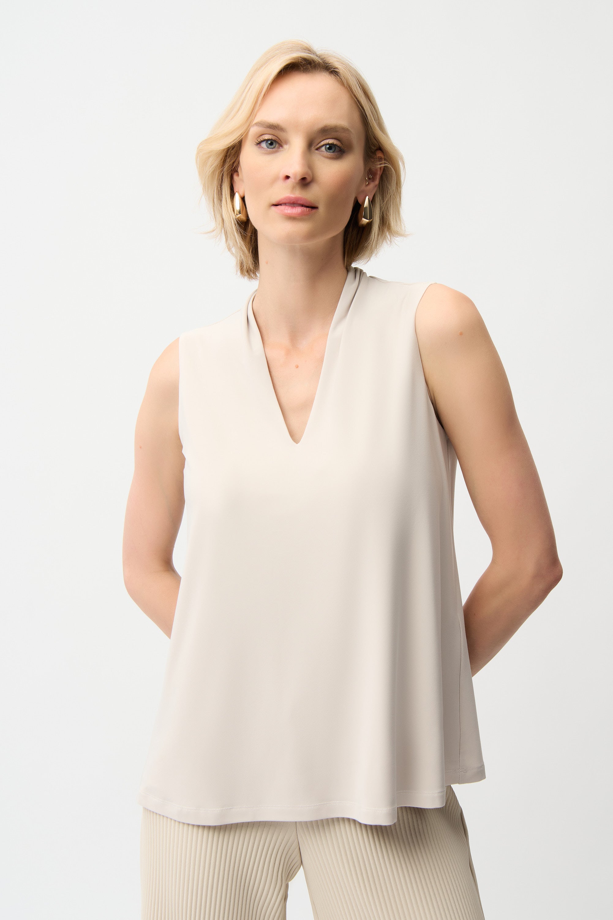 Silky Knit Sleeveless Trapeze Top With V-necklineline