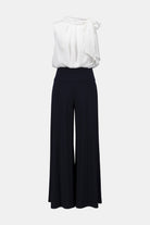 Signature | Silky Knit And Satin Wide Leg Jumpsuit With Contrast Bodice And Neck Bow Tie