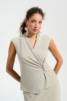 Signature | Sparkle Knit Wrap Top With Rhinestones Ornament