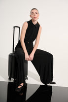 Silky Knit Wide Leg Jumpsuit With Zipped Neckline