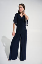 Signature |Silky Knit Wrap Wide Leg Jumpsuit With Rhinestone Trim